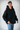 Kind dieser Stadt Schwarzer Oversized Männer Hoodie